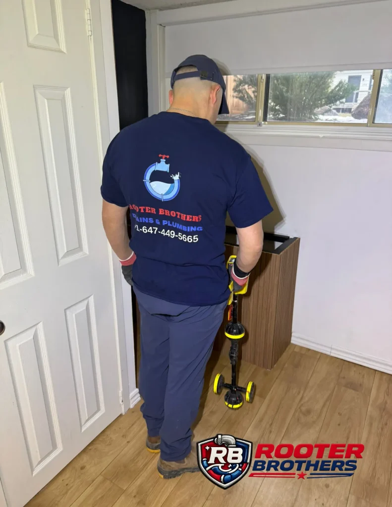 Plumber performing break inspection